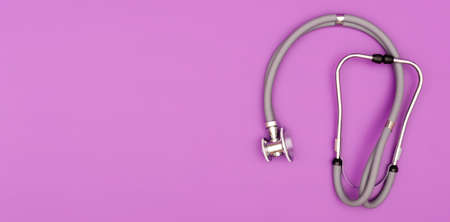 Stethoscope isolated on pink background.の写真素材