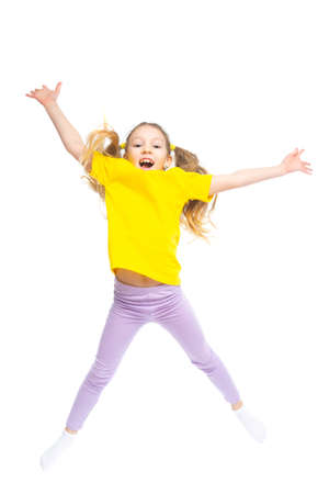 Little cute happy girl is jumping. Isolated on white background.の写真素材