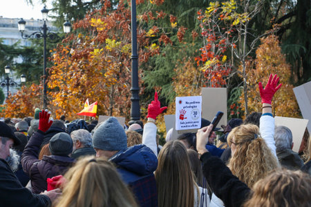 A group of self-employed workers are demonstrating in the city of Madrid, demanding respect for their rights while carrying flags, megaphones, and whistles.のeditorial素材