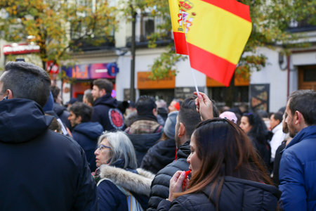 A group of self-employed workers are demonstrating in the city of Madrid, demanding respect for their rights while carrying flags, megaphones, and whistles.のeditorial素材