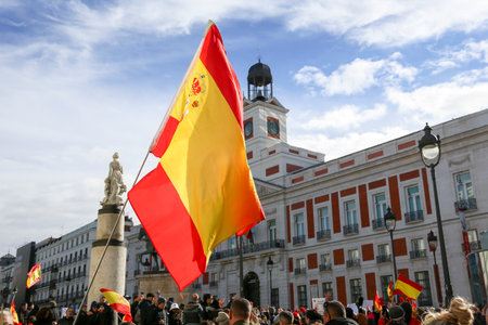 A group of self-employed workers are demonstrating in the city of Madrid, demanding respect for their rights while carrying flags, megaphones, and whistles.のeditorial素材