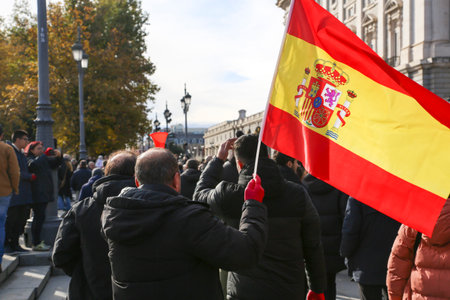 A group of self-employed workers are demonstrating in the city of Madrid, demanding respect for their rights while carrying flags, megaphones, and whistles.のeditorial素材