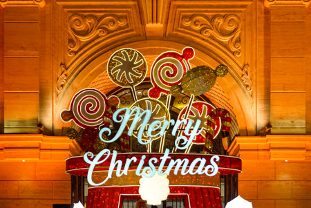 Merry Christmas lighting decoration with copy space for text. Christmas signs characters on a light board.の写真素材
