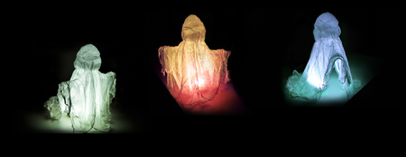 Halloween Ghosts on a Black Background. With Lighting Inside. (Color Distortion Effect). Panoramic Image for Skinaliの写真素材