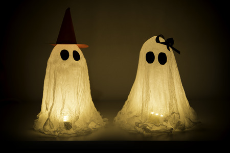 Pretty Young Halloween Ghosts. Girl And Boy (Couple). With Lighting Inside