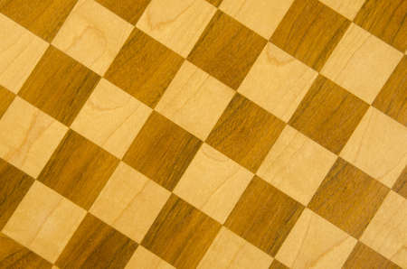 Fragment of checkers or chess board. Playful background.の写真素材