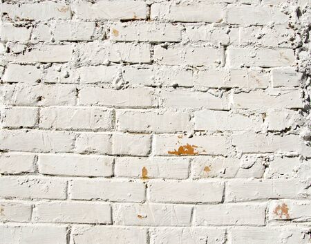 Background red brick wall painted white paint  Architectural backdrop  の写真素材