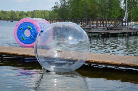 Zorbing air bubbles on water  Marina resort lake in Trakai  Most visited tourist place in Lithuania  の写真素材