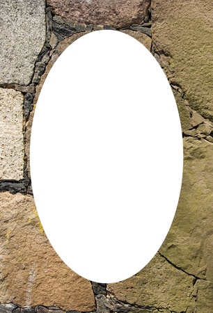 Historic building walls of brick and stone fragment. Isolated white oval place for text photograph image in center of frame. の写真素材