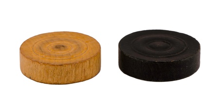 Wooden checkers isolated on white background  Simple game figures white and black  の写真素材
