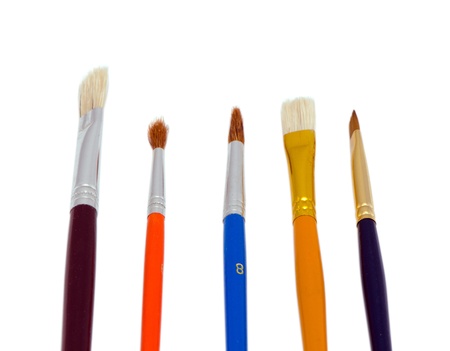 various different colorful new art paint brushes isolated on white background   