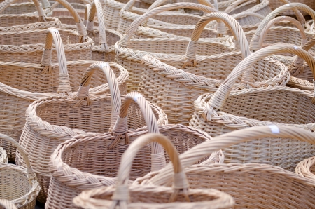closeup of wicker handmade diy wooden basket with handle sell in outdoor city street market fair  