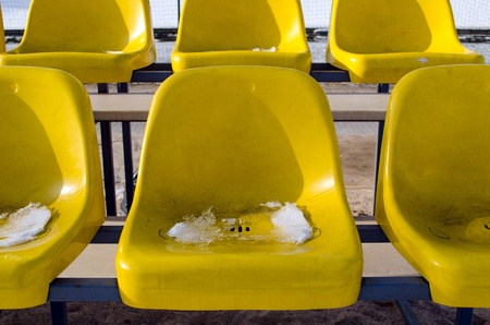beach volleyball yellow chairs in winter の写真素材