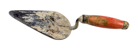 dirty old construction spatula pallet tool for cement leveling works isolated on white background. の写真素材