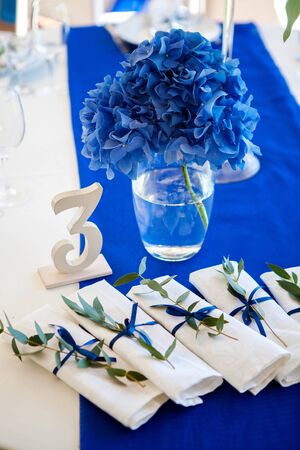 wedding blue decorations on the table and lavender
