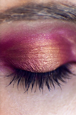 painted eyes different colors young girl in a macroの写真素材