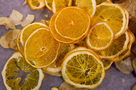 small white meringues with poppy seeds on a gray backgroundの写真素材