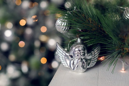 Christmas tree in the room in the snow, decoratedの写真素材