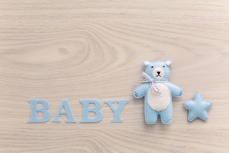 word baby and blue toy bear with starの写真素材