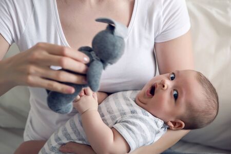 mother with her newborn son in handsの写真素材