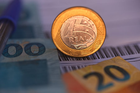 Real currency, Brazilian money. Money, accounts payable, Brazil, Reais, Coins. Brazilian coins on a...