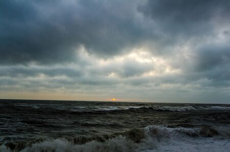 The evening after the storm in the ocean.の写真素材