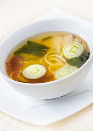 soup with meat and noodlesの写真素材