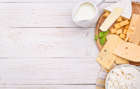 Various types of cheese with empty space background conceptの写真素材