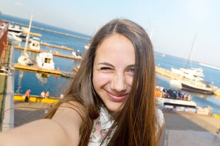 Self-portrait of a young beautiful womanの写真素材