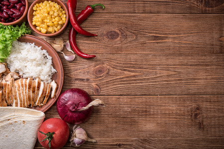 Homemade mexican chicken burrito. Concept of cooking.の写真素材