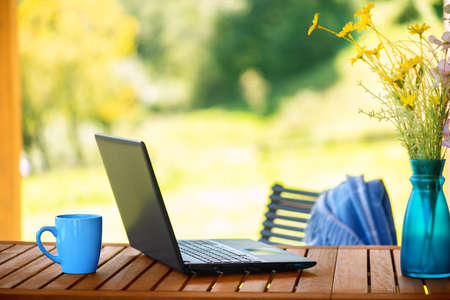 Concept of the workplace at mountain chalet, working remotely.の写真素材
