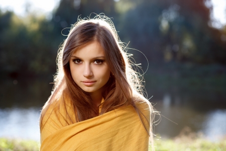 young beautiful woman wear scarf in her shouldersの写真素材