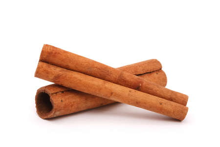 cinnamon bark isolated on whiteの写真素材
