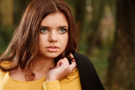 young female in forest posing looking awayの写真素材