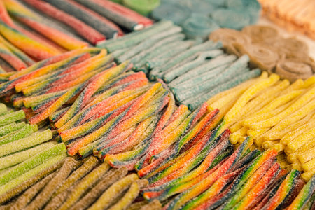 Assorted gummy candies and jellies on street market shop.の写真素材