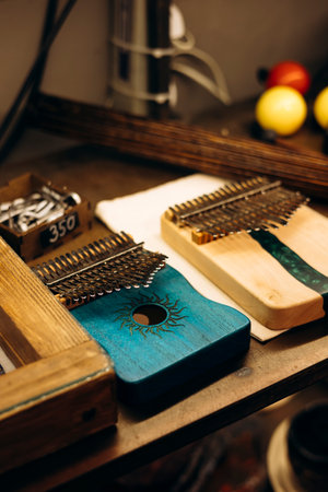 Kalimbas displayed on the counter of a music shop, African thumb pianos.の写真素材