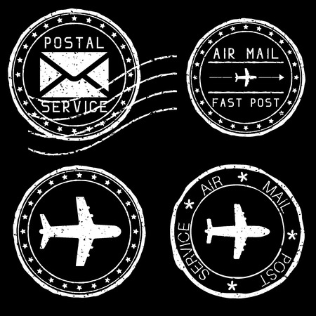 Mail stamps for envelopes. White vector illustration on black backgroundのイラスト素材