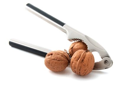 Walnuts with nutcrackerの写真素材