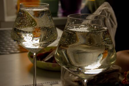 bubbles in the wine. champagne in a glass.の写真素材