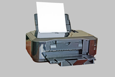 Inkjet black printer isolated on a grey 