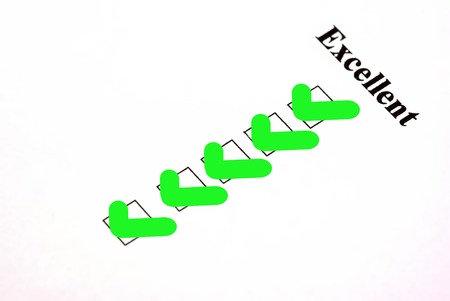 Customer satisfaction or service survey being filled out Excellent の写真素材