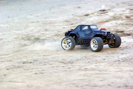 Speeding radio controlled car on the groundのeditorial素材