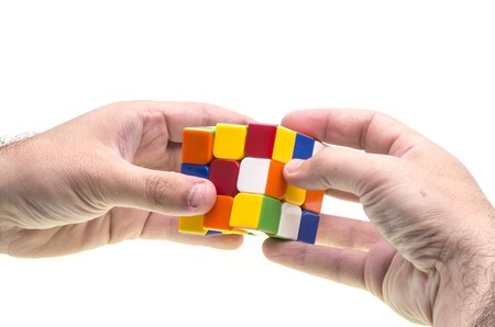 Hands resolving a Rubikのeditorial素材