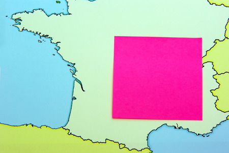 Pen and paper note on France map.の写真素材