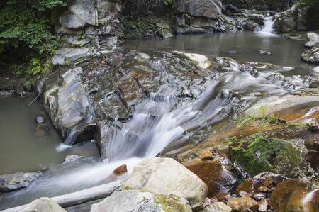 Cool mountain brook waterfall, Romanian Carpathians