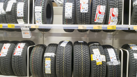 PIATRA NEAMT, ROMANIA - FEBRUARY 16: Stack of winter tires for sale in a shop on February 16, 2018 in Piatra Neamt, Romaniaのeditorial素材