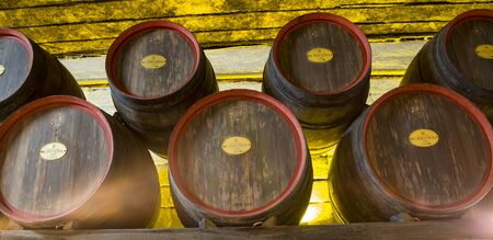 CRICOVA, MOLDOVA - NOVEMBER 13, 2018: Underground wine wooden barrels in Cricova Winery. Cricova...