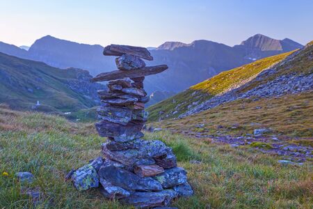 Stone pile in Romanian Carpathians, alpine area mark
