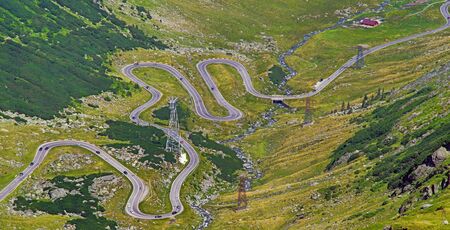Winding summer road seen from above, Transfagarasan road in Romanian Capathians.の写真素材