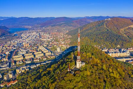 Aerial view of city and tower antenna, Autumn landscape in Romania, Piatra Neamt cityの写真素材
